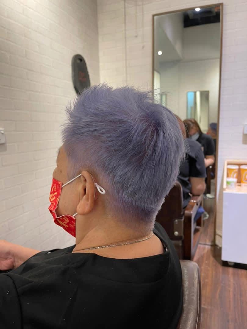 Finished bob hairstyle in a salon mirror